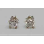 A pair of 18ct white gold set diamond ear studs, approximately 1 carat diamond weight