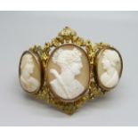 An antique gilt metal cameo bangle, largest cameo 30mm x 38mm, (small/narrow fitting)