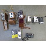 A Eumig cine camera, Kodak Brownie 8mm x 2, Bell & Howell model 220P and other Kodak, etc.