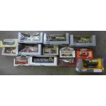 A collection of boxed model vehicles including Corgi