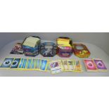 650+ assorted Pokemon cards including collector tins