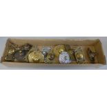 A collection of twelve brass door bell pushers