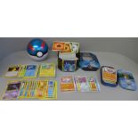 500 Assorted Pokemon cards including collector tins