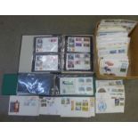 Stamps; a box of worldwide first day covers in albums and loose