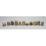 Ten silver thimbles and one other