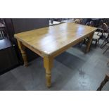 A pine farmhouse kitchen table