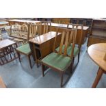 A Nathan teak drop-leaf table and four chairs