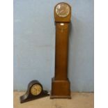 An oak dwarf case clock and an art deco oak mantel clock