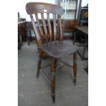 A Victorian elm and beech kitchen stool