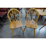 A pair of Ercol Blonde elm and beech Windsor chairs