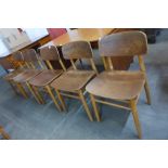 A set of five Danish Fritz Hansen teak and bent plywood chairs designed by Hans Wenger, a/f