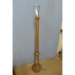 A vintage elm and bamboo floor standing lamp