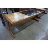 A G-Plan Fresco teak, tiled and glass topped coffee table