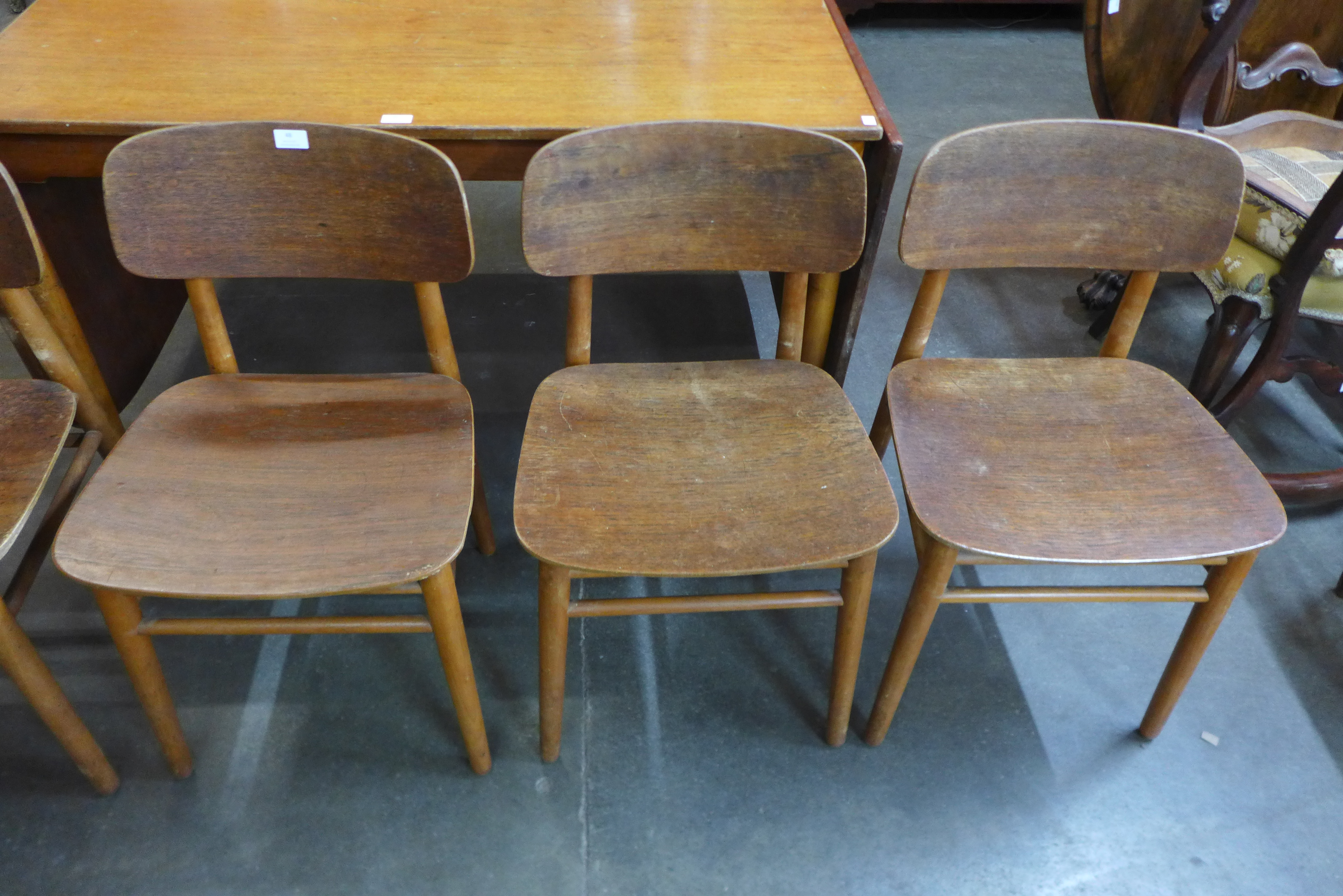A set of five Danish Fritz Hansen teak and bent plywood chairs designed by Hans Wenger, a/f - Image 4 of 6