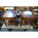 A pair of George III style mahogany lamp tables