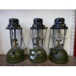 A set of three vintage paraffin lamps