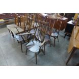 A set of six Ercol Golden Dawn elm and beech Goldsmith dining chairs