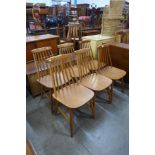 A set of six beech kitchen chairs