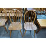 A pair of Ercol Blonde elm and beech Windsor chairs