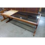 A G-Plan Fresco teak, tiled and glass topped coffee table