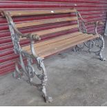 A Coalbrookdale style Serpent & Grapes pattern cast iron ended garden bench