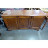 A Victorian mahogany fitted three door cupboard