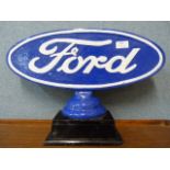A painted cast aluminium Ford sign