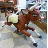 A fairground ride bull seat