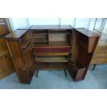 A Newcraft Ltd. teak home office cabinet