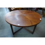 A McIntosh teak circular sunburst coffee table