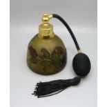 A cameo glass perfume atomiser decorated with flowers and leaves