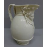 A Royal Worcester face mask jug, 21cm