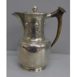 An Arts and Crafts plated jug with antler handle