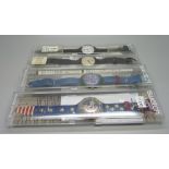 Four boxed Swatch wristwatches