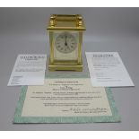 An English made solid brass carriage clock with silver mask by Taylor & Bligh, London, boxed, (