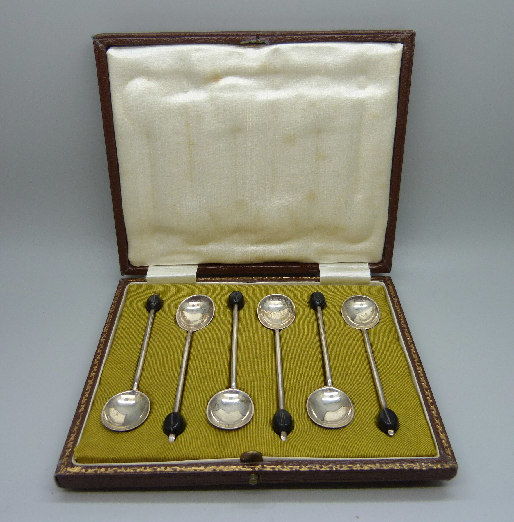 A set of six silver coffee bean spoons, Sheffield 1921, 50g