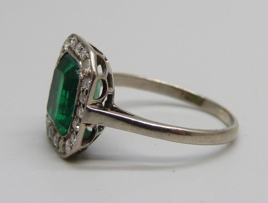 A white metal set Art Deco diamond and green stone ring, green stone a/f (large chip on one corner - Image 2 of 3