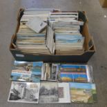 A box of early and modern postcards