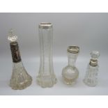 Two silver mounted scent bottles and two silver rimmed bottles, a/f