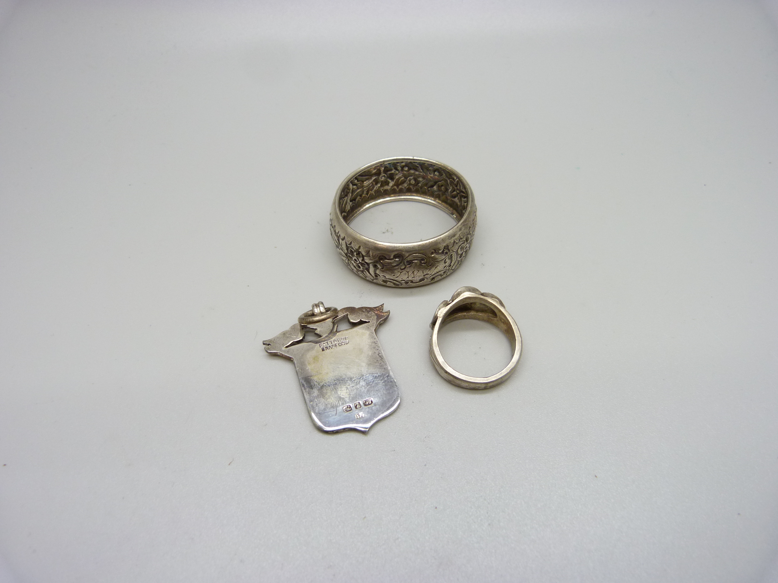 A silver ring, Moller, Trondhjem, P, a silver napkin ring and a late Victorian silver fob, - Image 2 of 2