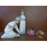 A Nao figure and one Lladro, a Caithness glass paperweight and one other