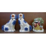 A pair of modern Staffordshire spaniels in blue colourway and a flatback figure