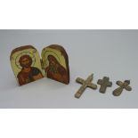 A Russian icon and three Russian crosses