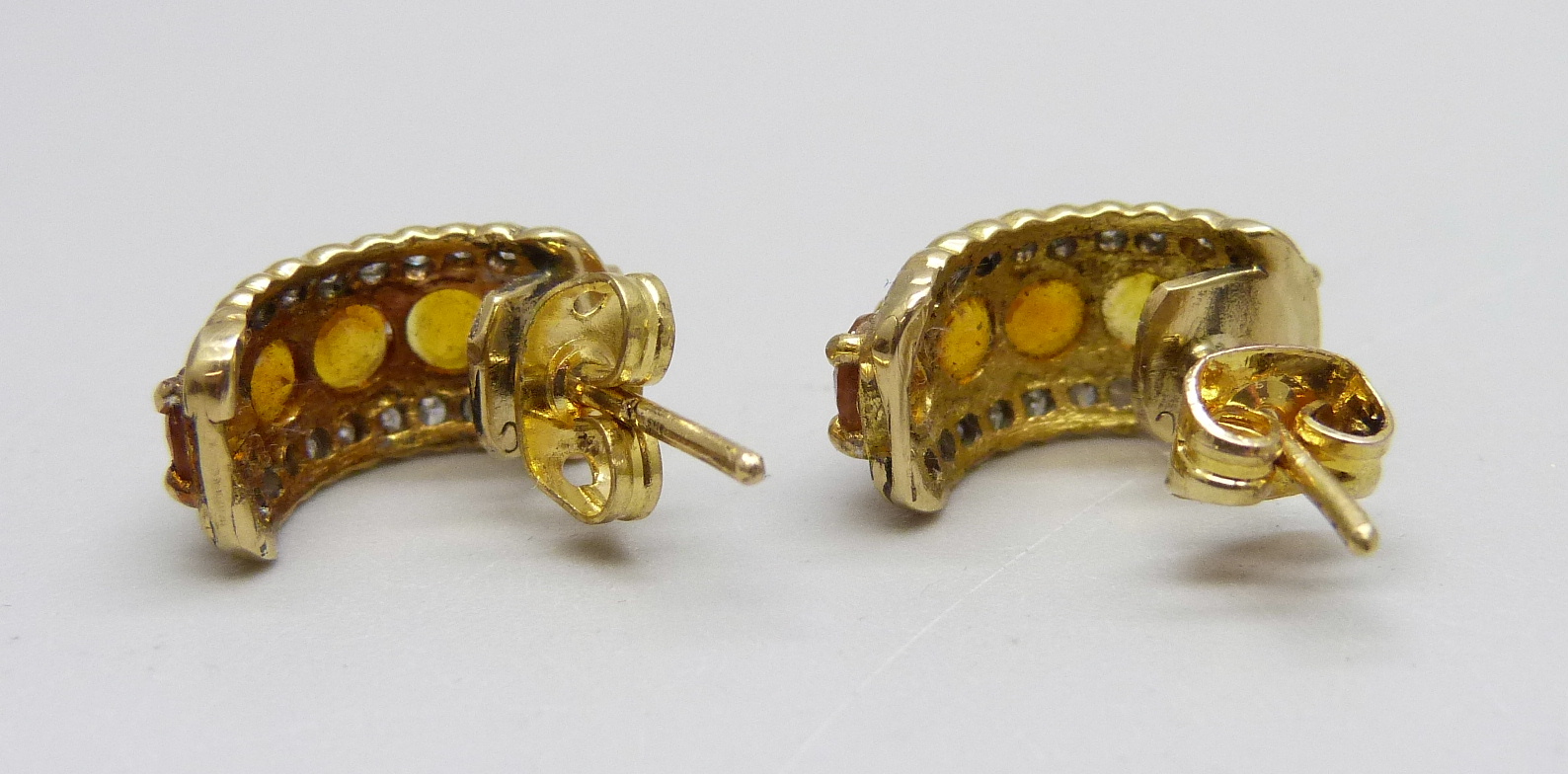 A pair of yellow metal set yellow sapphire and diamond earrings, 4.6g - Image 2 of 2