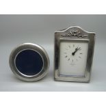 A silver fronted clock and a silver circular photograph frame, frame 9cm