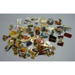 Fifty-one pin badges, including Stanley, Kodak and Coca-Cola