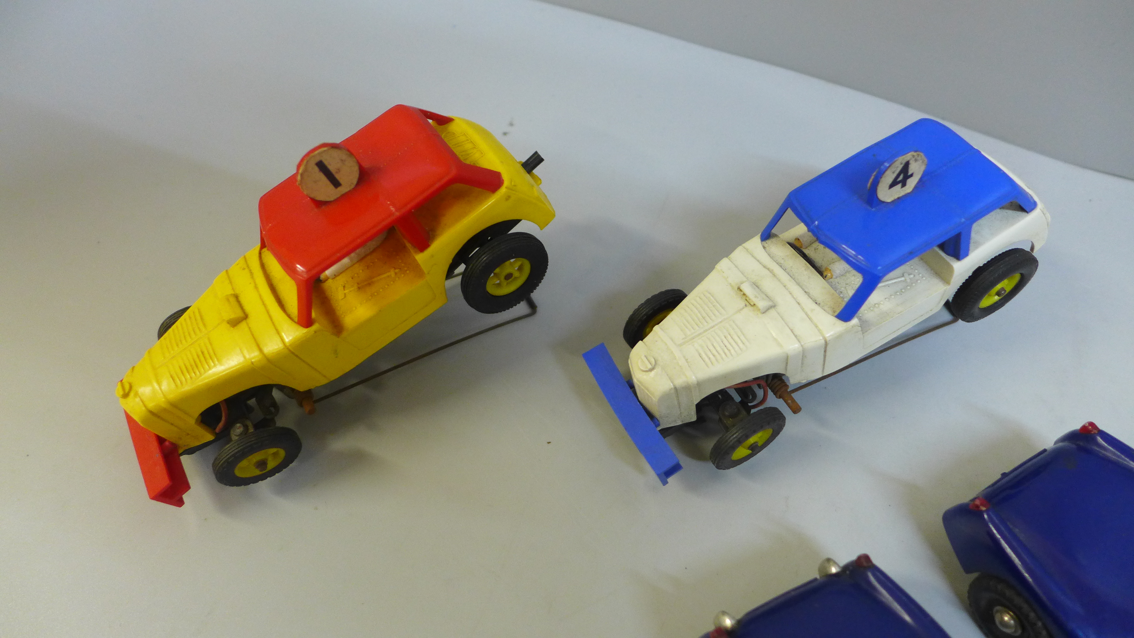 Four Victory Industries slot racing cars, one lacking wheel - Image 3 of 3