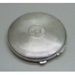 A silver compact