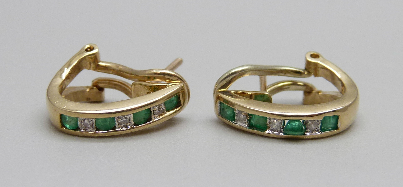 A pair of 9ct gold, diamond and emerald earrings, 3.4g