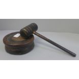 A wooden gavel and base